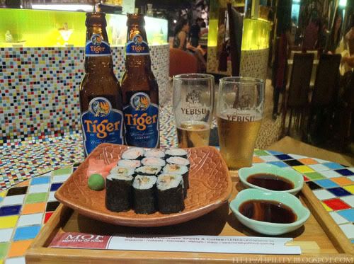 Its a good mixture of eating sushi and drinking beer at the same time ...