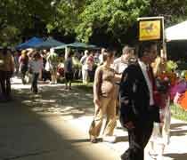 Shoppers looking for deals at the farmers market at the State Capitol
