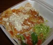 El Oasis Antojitos Mexicanos An enchilada plate from El Oasis on E. Michgian Avenue in Lansing.