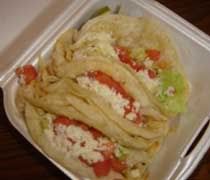 Three chicken tacos from El Oasis inside Tonys Party Store in Lansing.