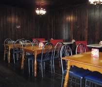 Harland Sanders Cafe & Museum The original dining room, but with newer chairs.